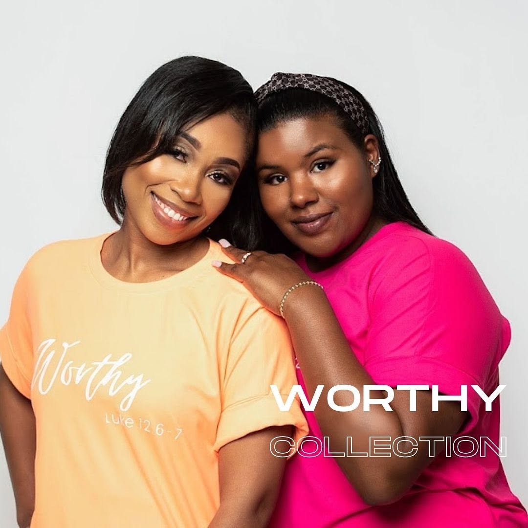 Two women wearing Worthy collection shirts from Love Perseveres